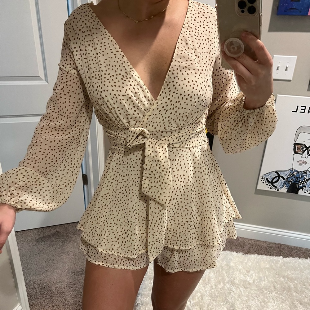 Polka dot layered romper.